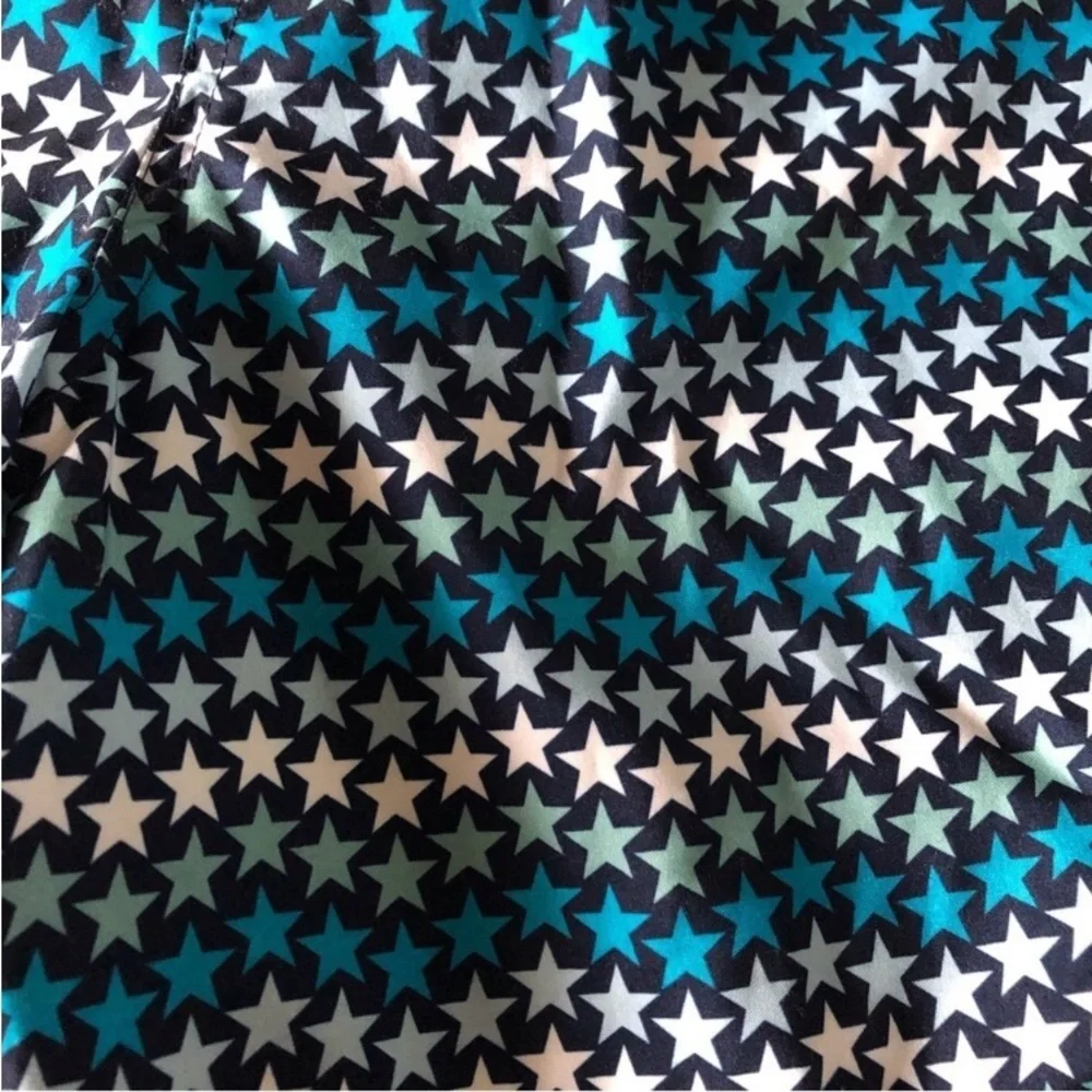 George blue striped star pattern swim trunks in size M (32-34)